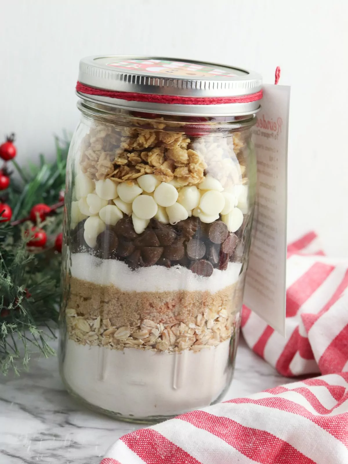 reindeer cookies in a jar ingredients layered.